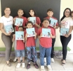 Ayra Kip cu donacion di buki na Scol Basico Xander Bogaerts